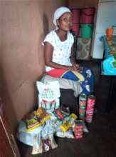 A child-headed household receives a food hamper