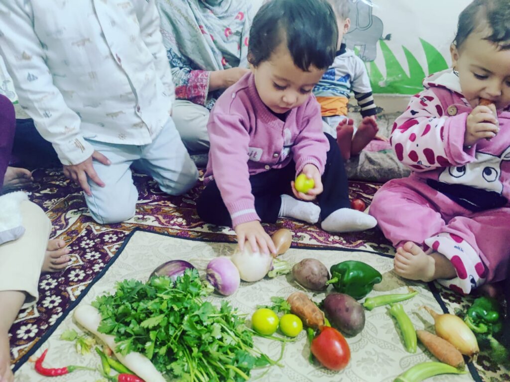 Children engaged in practical activities at center