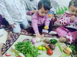 Children engaged in practical activities at center