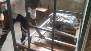 Boy with broken Bed