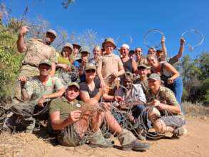 International and local volunteers with snares