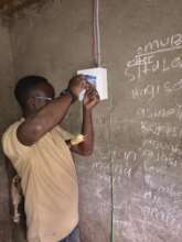 Wiring a newly connected house in Mbata