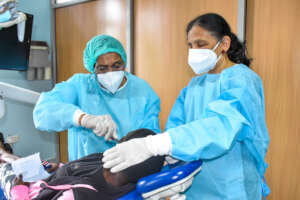 Volunteer Dentists  performing a dental procedure