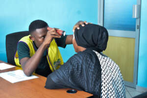 A doctor attending to a patient at the eye camp.