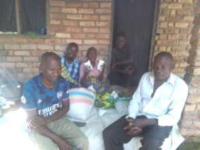 Gogo Hilda receiving groceries