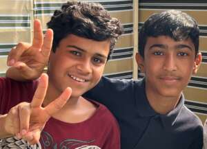 Two happy boys from new Hope Bus 3