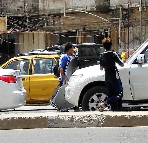 Street Lawyers, Doctors, Hope Buses for Iraqi Kids