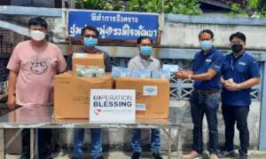 Handing over masks to community in Bangkok
