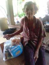 Distributed food packages to elderly person