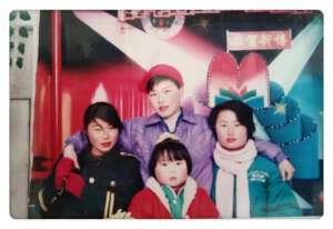 Lucky (in red) with family