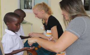 Children getting medication against worms