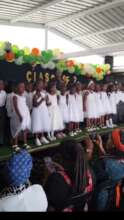 Children singing at the 2023 Graduation at Ubunye