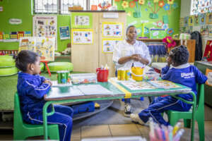 Teacher in class with her students