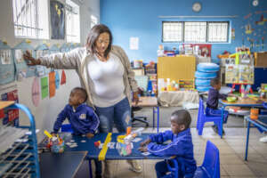 Teacher in class with her students