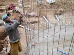Community members building the water reservoir