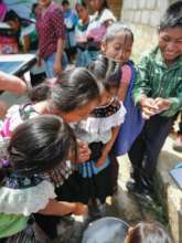 Tseltal children washing hands