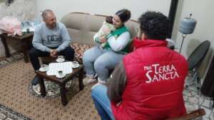 Mussa, Leila and Habib in their home.