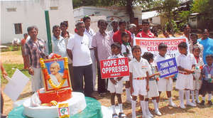 CHILDREN & PARENTS HONORING "FATHER OF NATION"