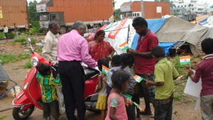 children receiving chocolates