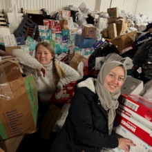 Volunteers in a very full warehouse!