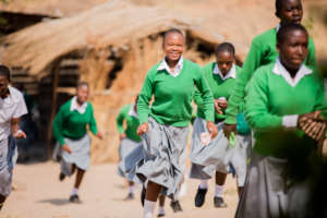 Girls running to class
