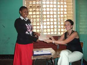 AfricAid staff with student
