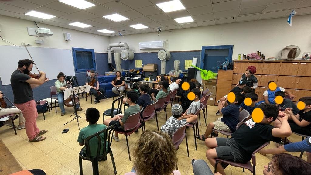 Musethica musicians preform at the Keshatot School