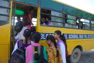 Blossom Bus girls boarding at Durga village