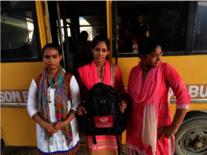 Lokesh (middle) on the Blossom Bus to College