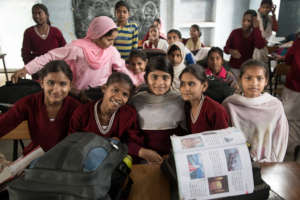 Blossom Bus girls in front of the class
