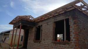 Structure ready for roofing showing entrance porch