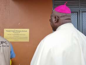 Bishop Sabino Odoki unveils the memorial plaque