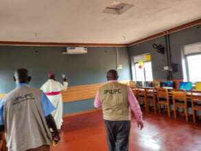 Bishop blesses the computer lab