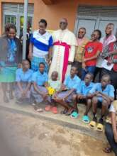 Bishop's photo with some dignitaries and pupils