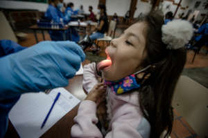 Health - doctor checking the student health