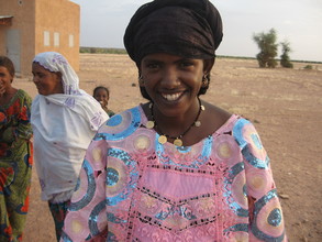 A happy mother in Mayat.