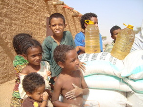 Children in Tadek with Food Aid