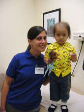Little Natali stands tall with her Chemo Pal.