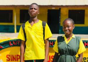 Princess and her brother at their campus in Totata