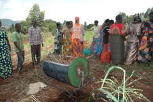 Firing the RoCC biochar kiln lit in the field