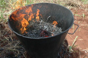 Firing of the Kon Tiki biochar kiln at the trainig