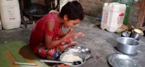 Girl eating her food