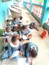 Homework time for the children at Mother's Vision