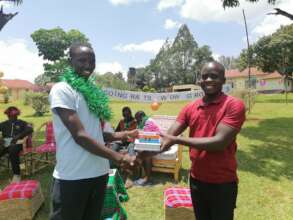 Paul receiving his Cert, Phone and Photo album