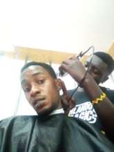 Samuel training to be a barber