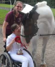 A prizewinning pair and helper at Barrow Farm