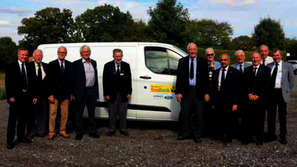 Club Members with Food Bank van part-funded by us