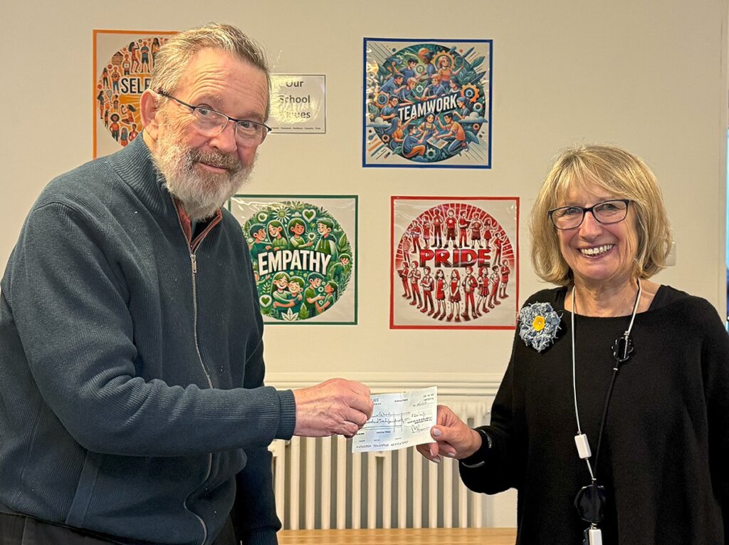 Presenting the Pen Pals cheque to Quilters school