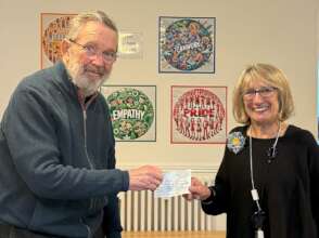 Presenting the Pen Pals cheque to Quilters school