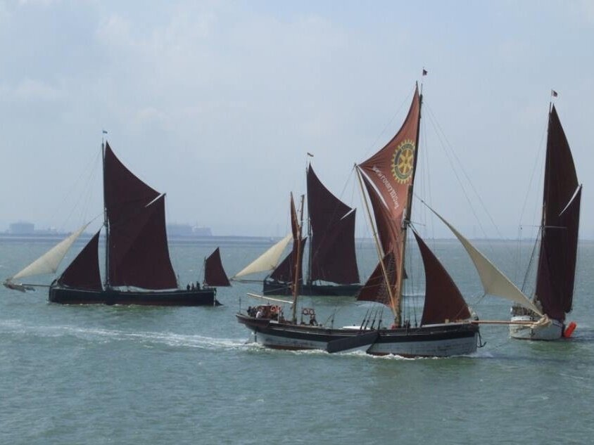 Some distinctive Thames Barges under sail
